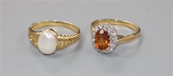 Two 18ct gold and gem set rings including baroque pearl and citrine and diamond.